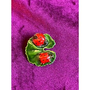 Vintage lady bugs on green leaf pin marked original by Robert